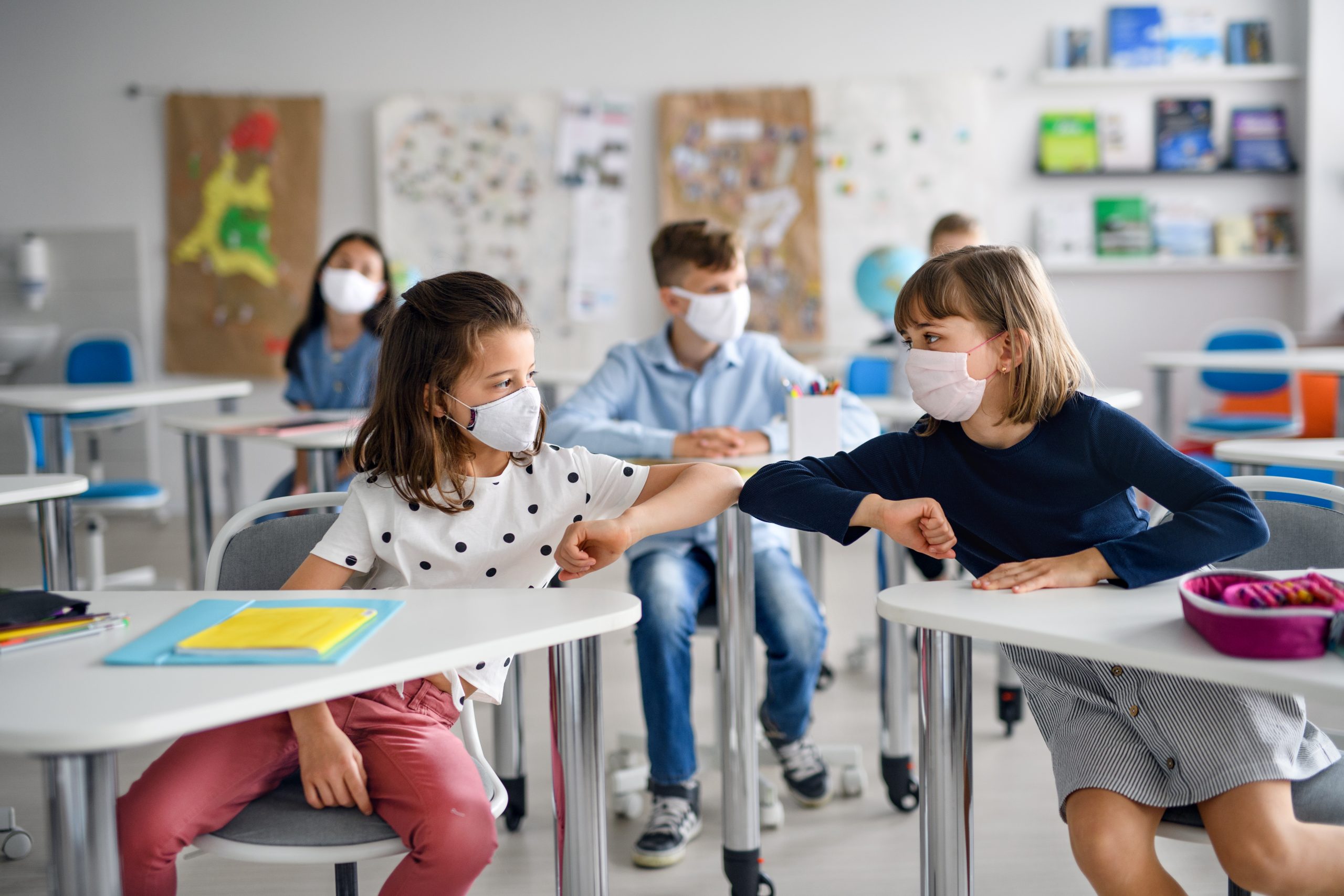 Kids back in school during COVID wearing masks